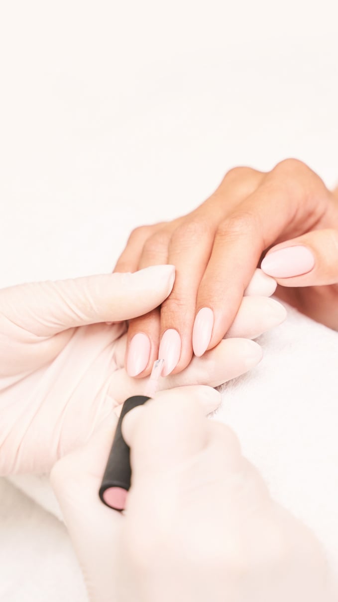 Woman Getting a Manicure 